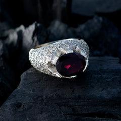 Aria elegant red halo ring for women with a large red gemstone surrounded by small clear stones