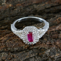 Tereza red halo ring for women with a rectangular red center stone and diamond accents on silver band