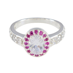 Ivana elegant red halo ring for women with oval center stone and surrounding red gemstones