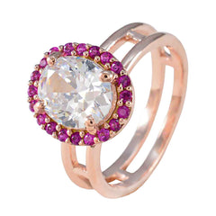 Josephine red halo ring for women featuring a large clear center stone surrounded by small red gemstones