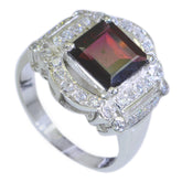 Autumn red halo ring for women featuring a square red gemstone surrounded by sparkling white stones