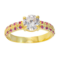 Xiu red halo ring gold with central round clear stone and small pink and white gemstones on gold band