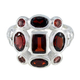 Joaquina red navratna ring sterling silver multi stone cluster with central rectangular deep red gemstone