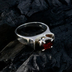 Nisa Red Solitaire Engagement Ring with Oval Gemstone