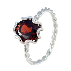 Wen red solitaire gemstone ring with twisted silver band and deep red faceted stone