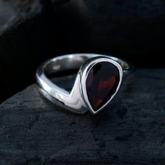 Priya elegant red solitaire ring with teardrop-shaped gemstone set in silver band