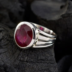 Kristine red solitaire ring for women with a large round red gemstone set in silver band