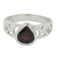 Renata red solitaire ring for women with teardrop shaped red gemstone and silver intricate band