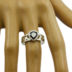 Renata red solitaire ring for women with teardrop shaped gemstone on silver band