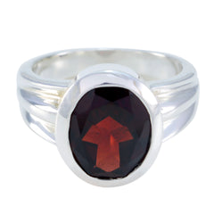 Bianca red solitaire ring for women with a round deep red gemstone set in a silver band