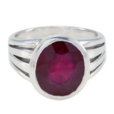 Kristine red solitaire ring for women with a large faceted red gemstone set in silver band