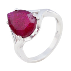Putri red solitaire ring for women with a large pear-shaped red gemstone set in a silver band