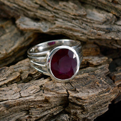 Kristine red solitaire ring for women with a large deep red gemstone on silver band