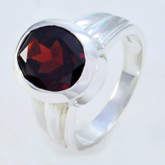 Bianca red solitaire ring for women featuring a round deep red gemstone set in polished silver band