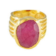 Lara gold ring with bezel set rough faceted ruby centerpiece red solitaire ring with wide ribbed band
