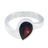 Priya silver ring featuring a red solitaire ring with a teardrop-shaped red gemstone