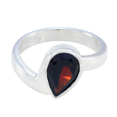 Priya silver ring featuring a red solitaire ring with a teardrop-shaped red gemstone