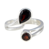 Lara silver ring featuring two red gemstones in an open design red toi et moi ring