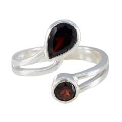 Lara silver ring featuring two red gemstones in an open design red toi et moi ring