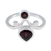 Savannah red toi et moi ring with two deep red gemstones set in a polished silver band