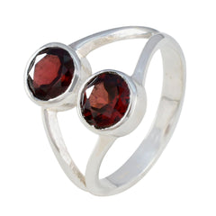 Olivia red toi et moi ring with two round red gemstones set in silver band