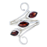 Ayesha silver red trilogy gemstone ring with three marquise-cut red gemstones and elegant swirling band design