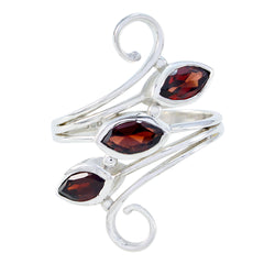 Ayesha silver red trilogy gemstone ring with three marquise-cut red gemstones and elegant swirling band design