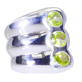 Ines retro green gemstone ring with three round green gemstones set in a polished silver band