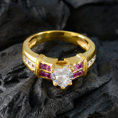 Daniela romantic red halo ring with heart-shaped center stone and gold band with red and clear accents