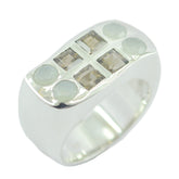 savannah cocktail ring silver wide band with four square light brown stones and four round pale cabochons