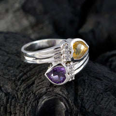 Lucia toi et moi heart ring with yellow and purple heart-shaped gemstones on silver band