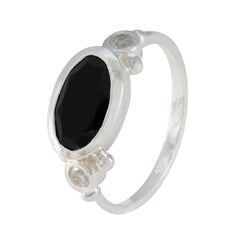 Natalie sterling silver ring with oval black stone and two small clear accents trendy black trilogy ring