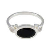 Natalie sterling silver ring with oval black stone and two small clear side stones trendy black trilogy ring