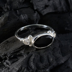 Natalie sterling silver ring with oval black onyx and two small diamond accents trendy black trilogy ring