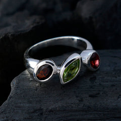 Angel trendy gemstone trilogy ring with green marquise center stone and two red round side stones