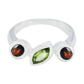 Angel trendy gemstone trilogy ring with green marquise and two round red stones set in silver band
