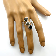 Julia silver adjustable ring with three teardrop stones black and green on display trendy multicolor trilogy ring