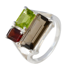 Lucia trendy multicolor trilogy ring with green, red, and brown gemstones in silver setting