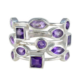 Trendy purple gemstone ring by Eva featuring multiple purple stones in various shapes set in silver