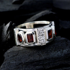 Aurora trendy red gemstone ring with rectangular and oval red stones set in textured silver band