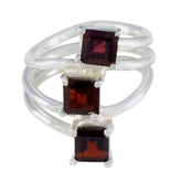 Natcha sterling silver ring with three red square stones stacked in split bands trendy red trilogy ring