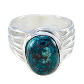 Emilia turquoise solitaire ring with oval stone set in silver band with split shank design