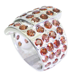 Ida vintage red gemstone ring with multiple red crystals set in a wide silver band
