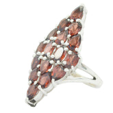 Violet antique gemstone ring with multiple marquise red stones set in silver band