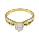 Violet green gemstone wedding ring with gold band and heart-shaped clear center stone
