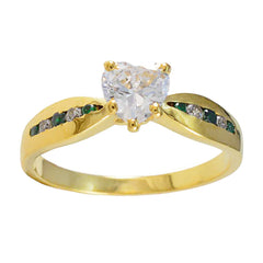 Violet green gemstone wedding ring with heart-shaped center stone and gold band