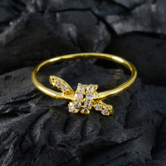Meera gold ring with sparkling white gemstones in a delicate white gemstone fashion ring design