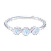 Ling delicate white gemstone ring for women featuring three small round white gemstones in silver band