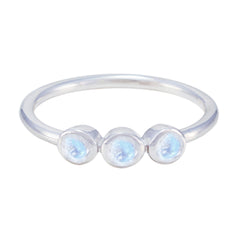 Ling delicate white gemstone ring for women featuring three small round white gemstones in silver band