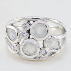 Julia white gemstone statement ring in sterling silver featuring multiple round and pear shaped white stones